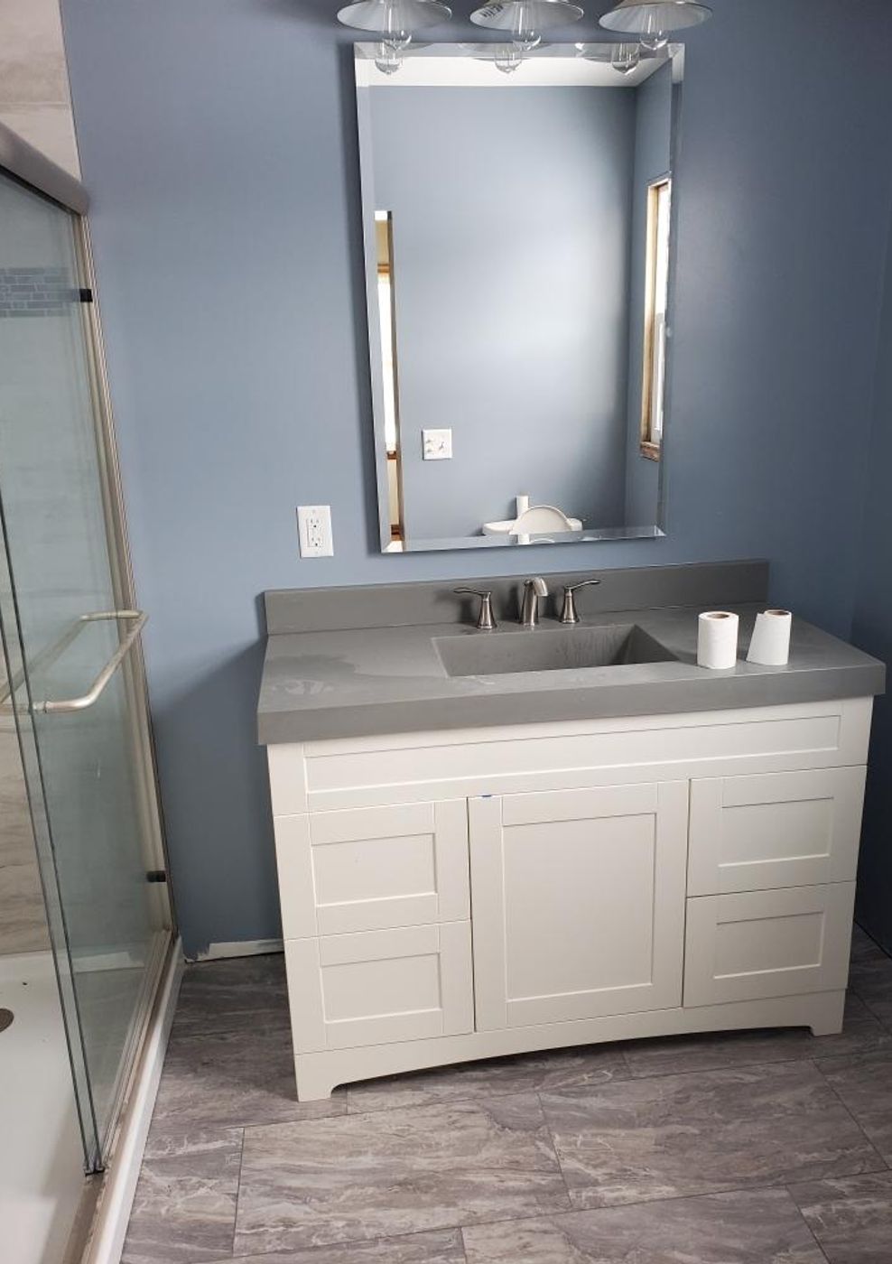 Finished bathroom remodel completed by Atlas High Performance Homes