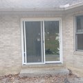 Sliding Glass Door Installed On Brick Wall