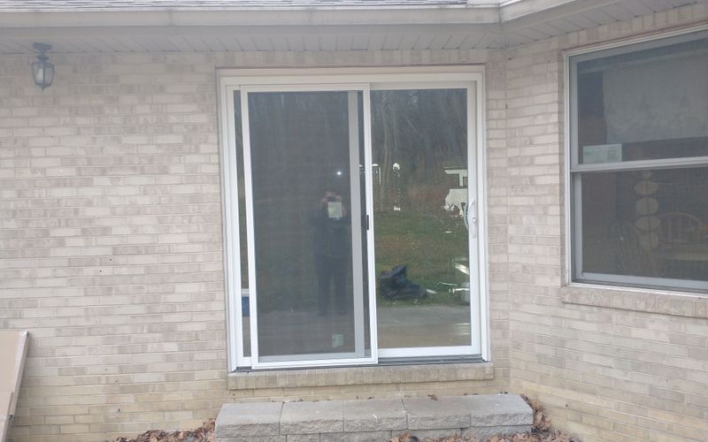 Sliding Glass Door Installed On Brick Wall