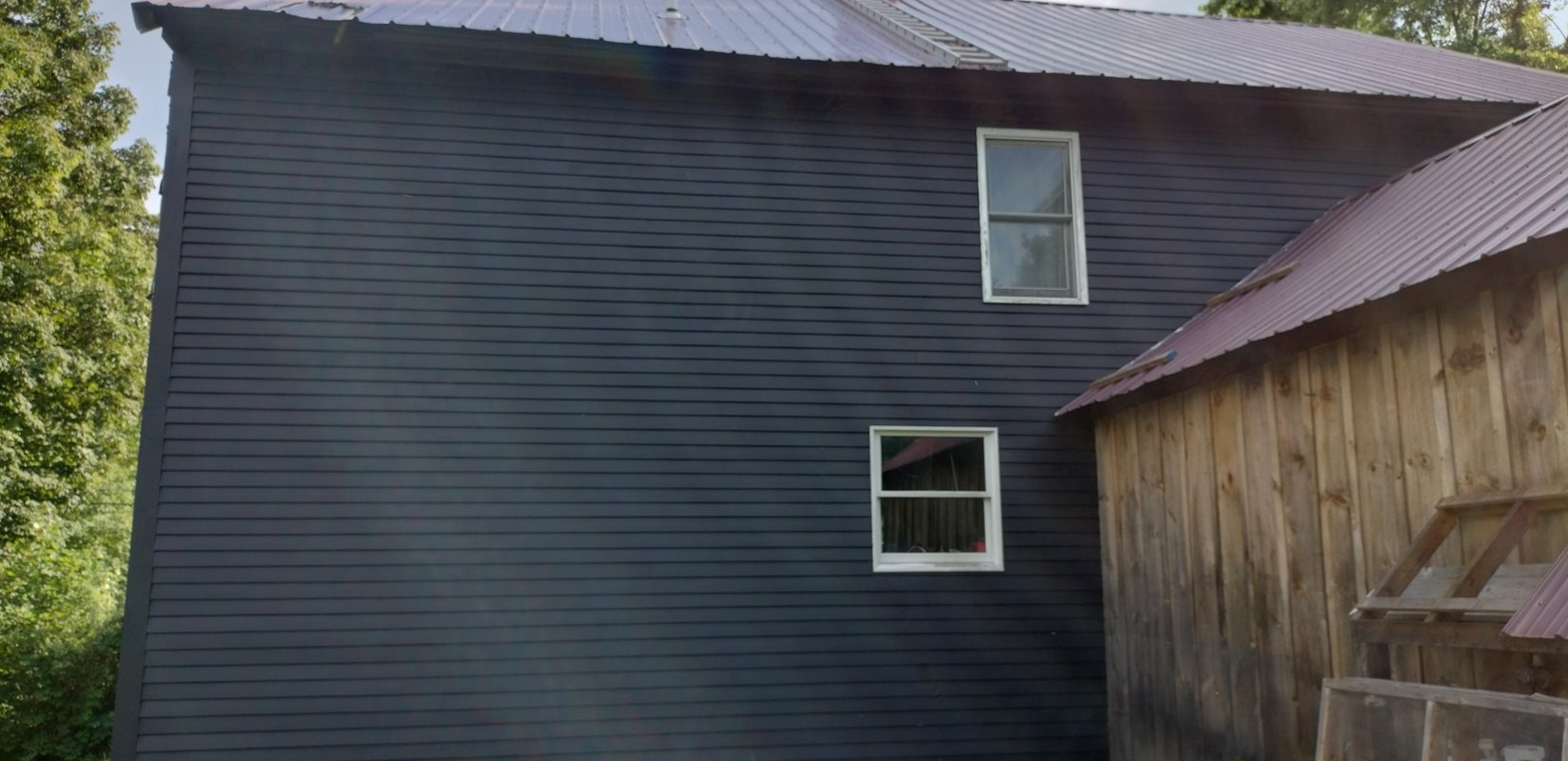 Stained Black Wood Lap Siding