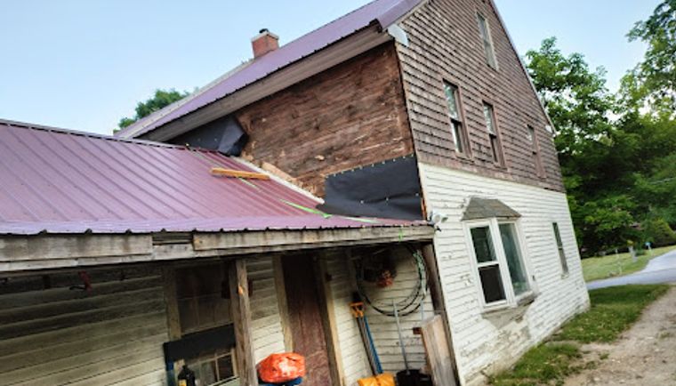 Home exterior before siding remodel